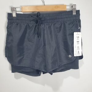 REEBOK WOMENS WOVEN SHORTS  BLACK DRI MATERIAL BREATHABLE SIZE SMALL NWT